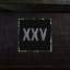 XXV